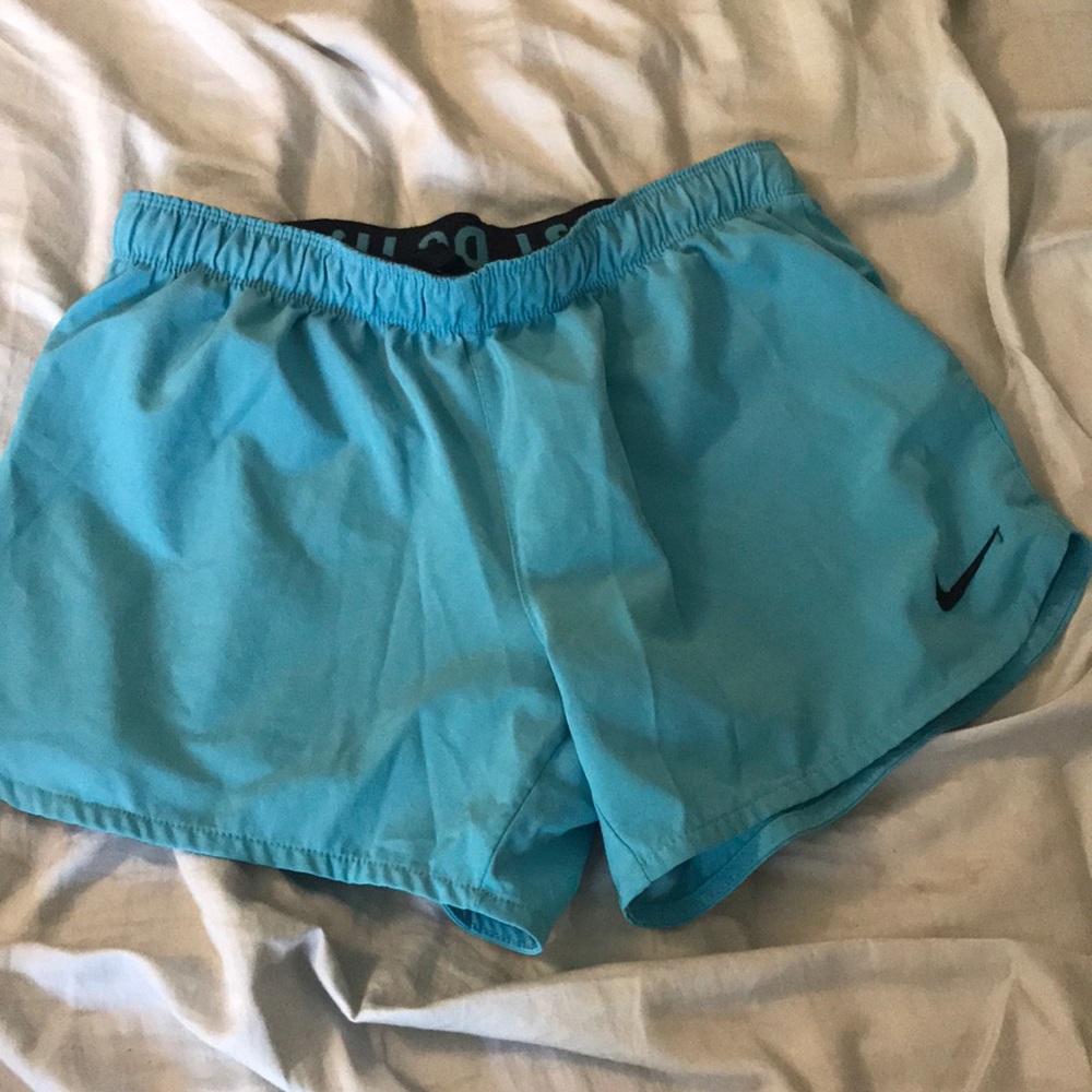 Nike blue dry fit shorts with spandex shorts liner